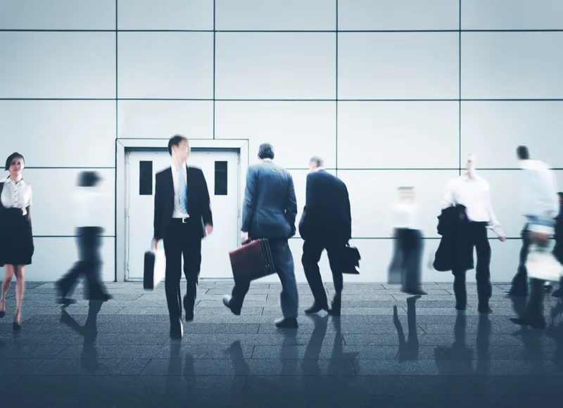 Busy business people in the city, representing fast-moving digital business