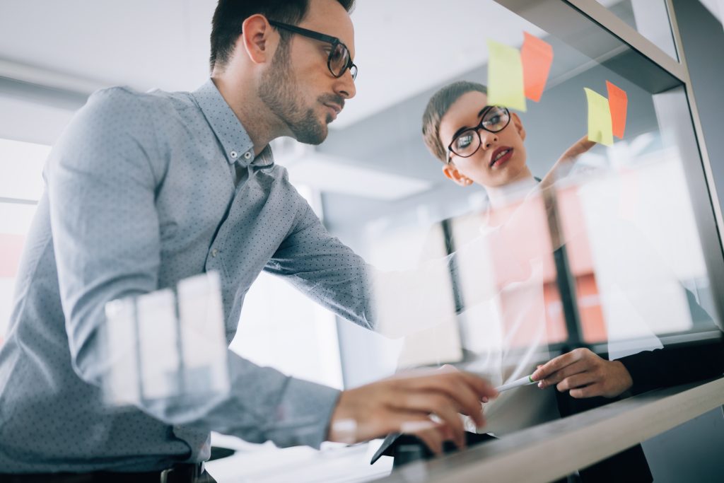 Corporate teamworking colleagues in modern office